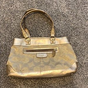 Gold coach purse